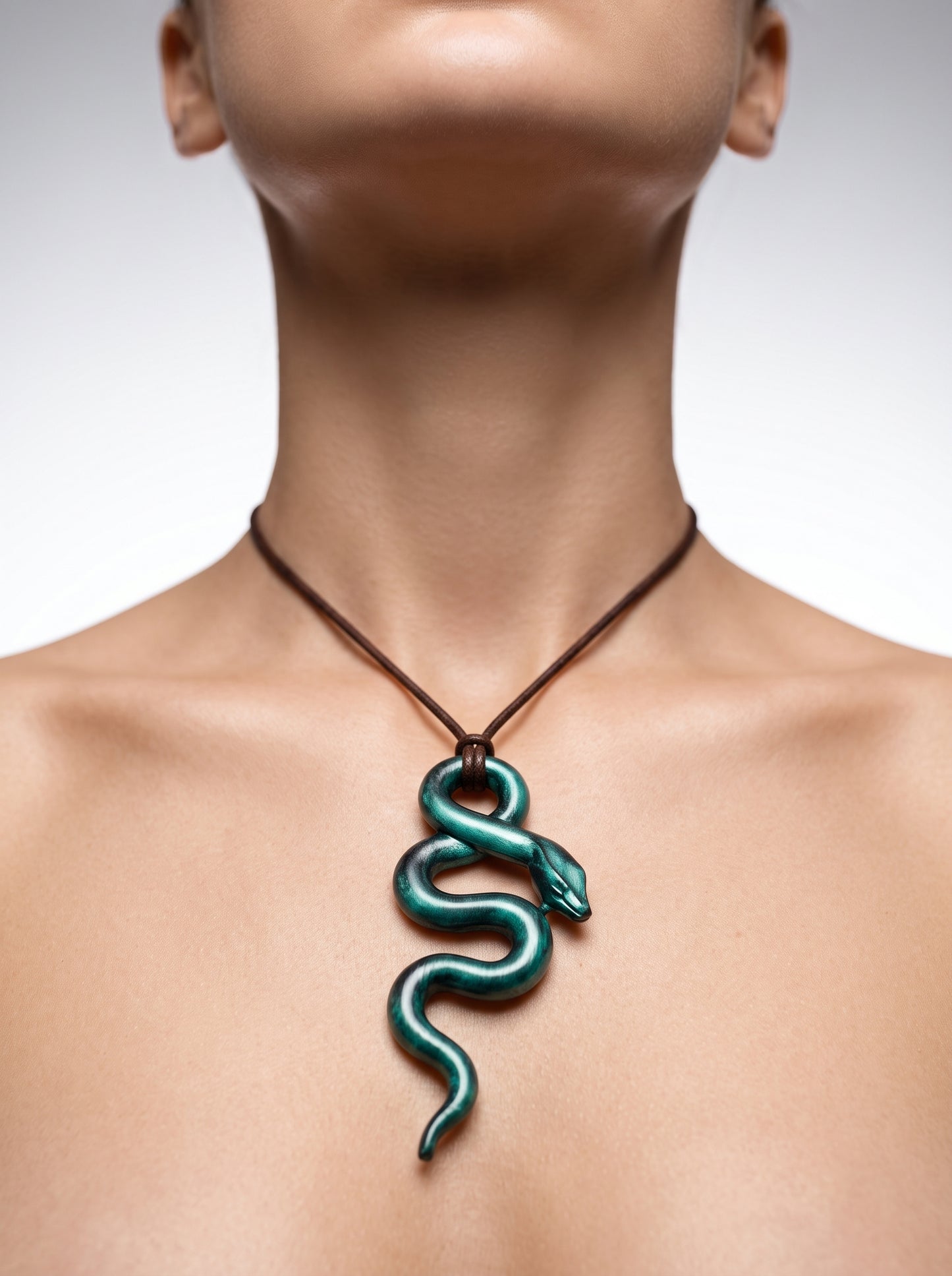 The Emerald Viper Sculpted Clay Pendant