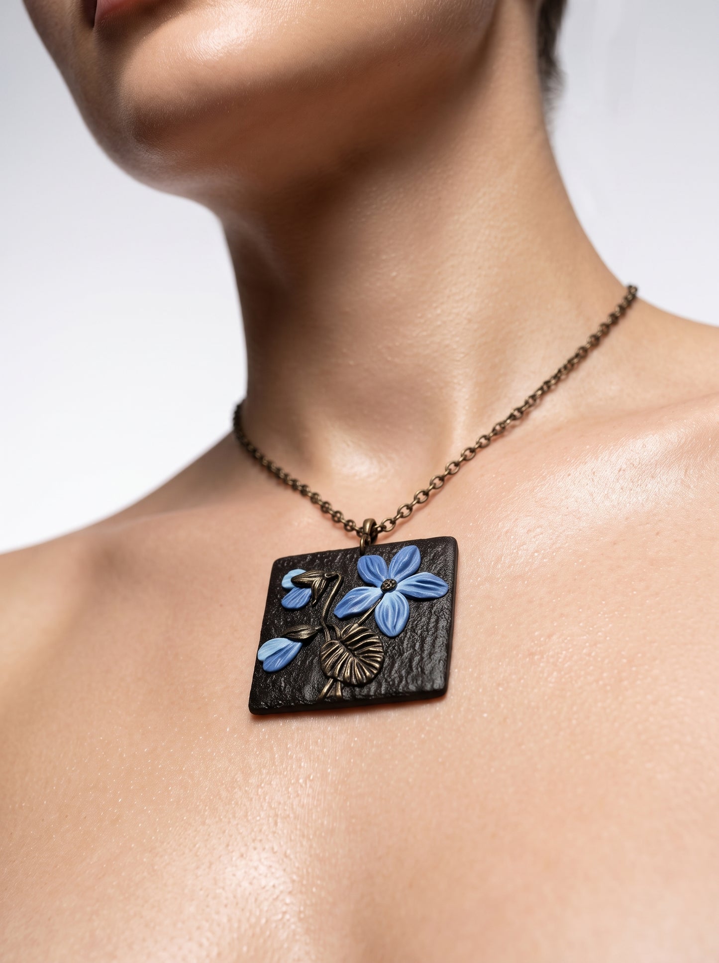 The Midnight Blossom Clay Relief Pendant